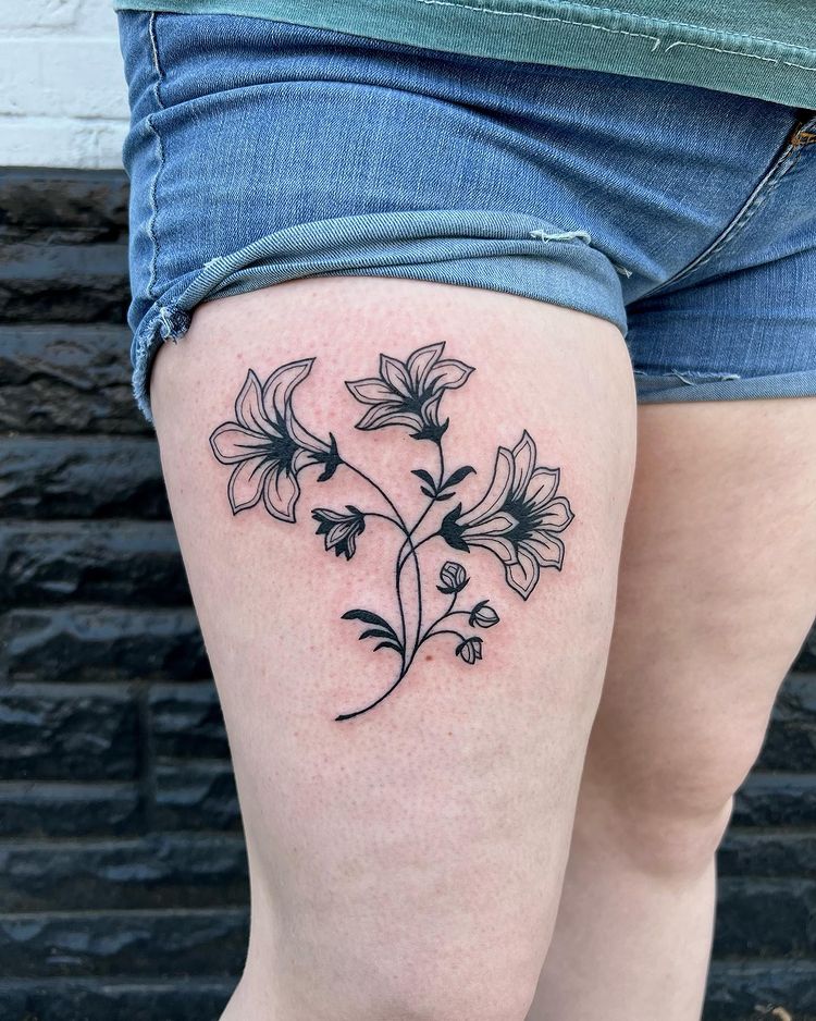 travel thigh tattoo